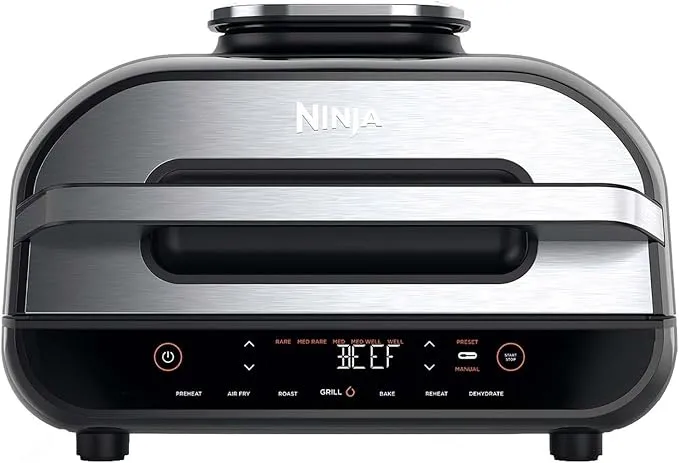 Ninja Foodi MAX health grill and air fryer with 6 cooking functions in grey and silver.