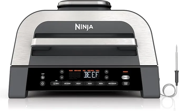 Ninja Foodi Smart XL 6-in-1 indoor grill and air fryer in black and silver with smart thermometer.