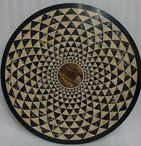 Handmade black marble inlay table top with intricate pietra dura design for home and garden decor.