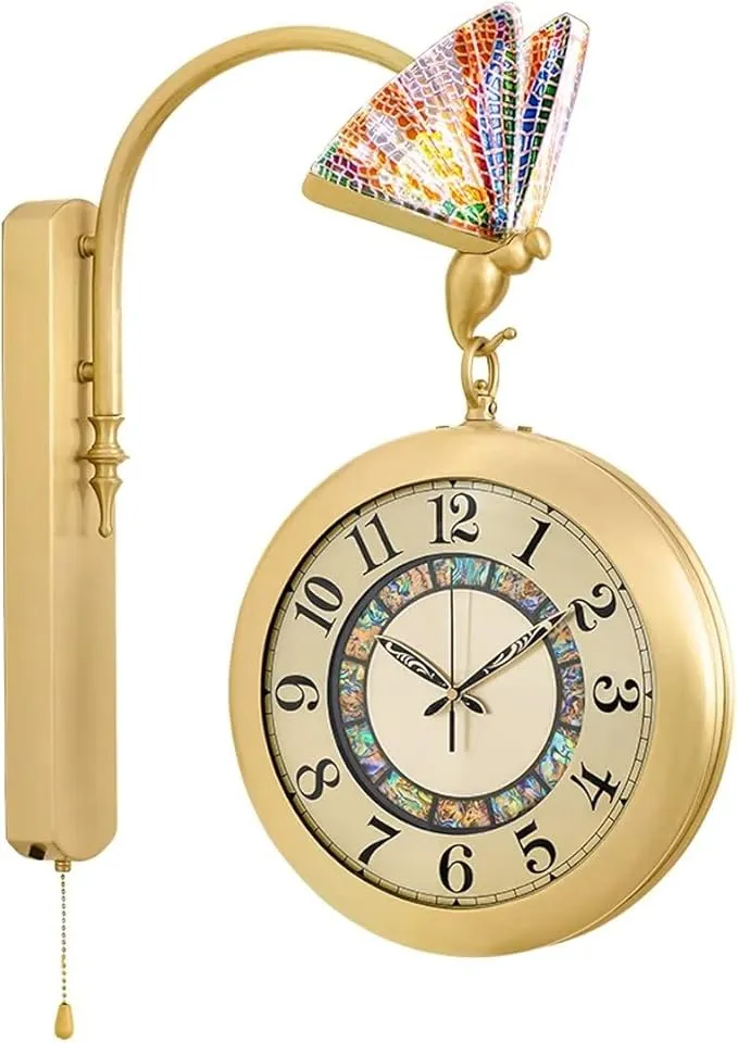 Modern luxury double-sided brass wall clock with European-style butterfly design for living room decor.