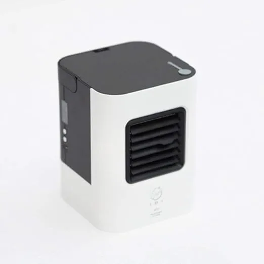 XXKT mini portable air conditioning fan with 4 caster wheels in white for home or dormitory.