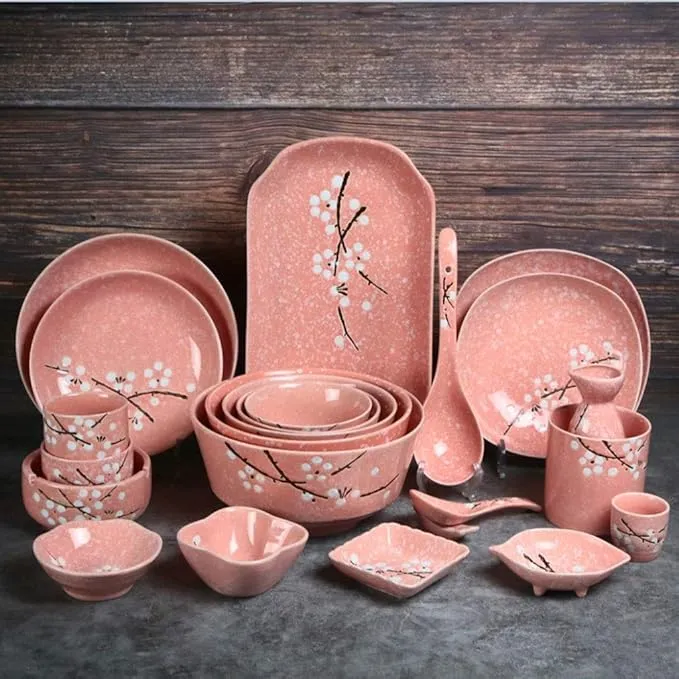 12-piece ceramic tableware set including dinner and fruit bowls.