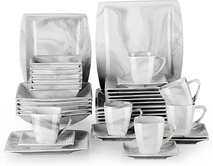 36-piece marble dinnerware set with plates, bowls, and cups.