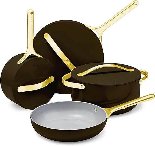 12-piece Caraway black nonstick ceramic cookware set with oven-safe pots and pans.