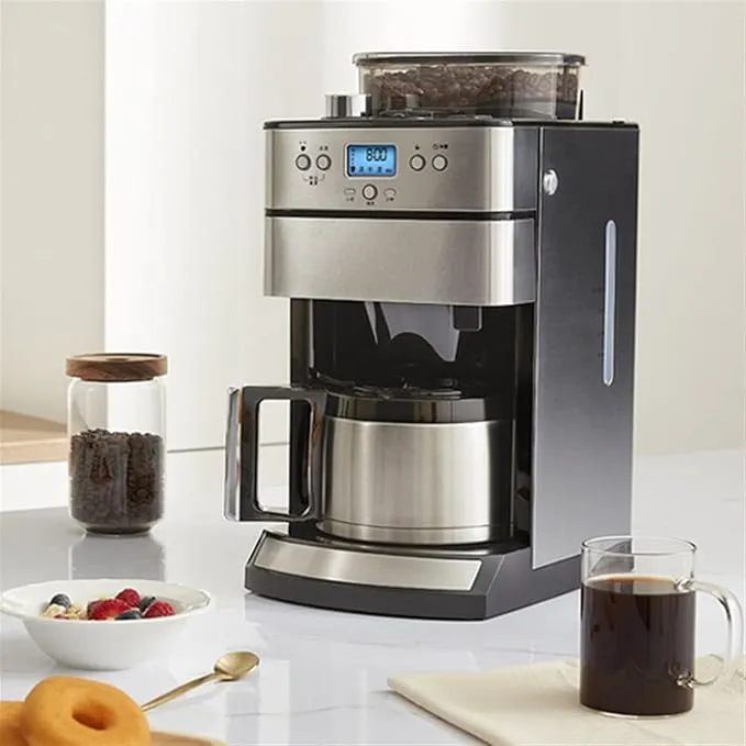 Compact fully automatic coffee machine for home brewing.