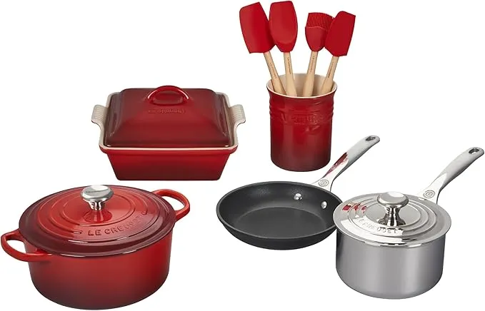 Le Creuset 12-piece kitchen cookware set in Cerise with multi-material pots and pans.