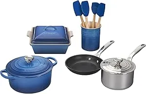Le Creuset 12-piece mixed material cookware set from the Marseille Collection, including pots and pans.