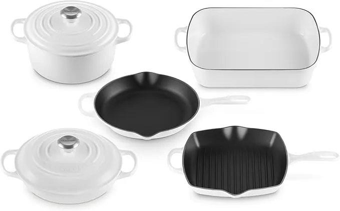 Le Creuset 7-piece signature cookware set in white, including a rectangular roaster.