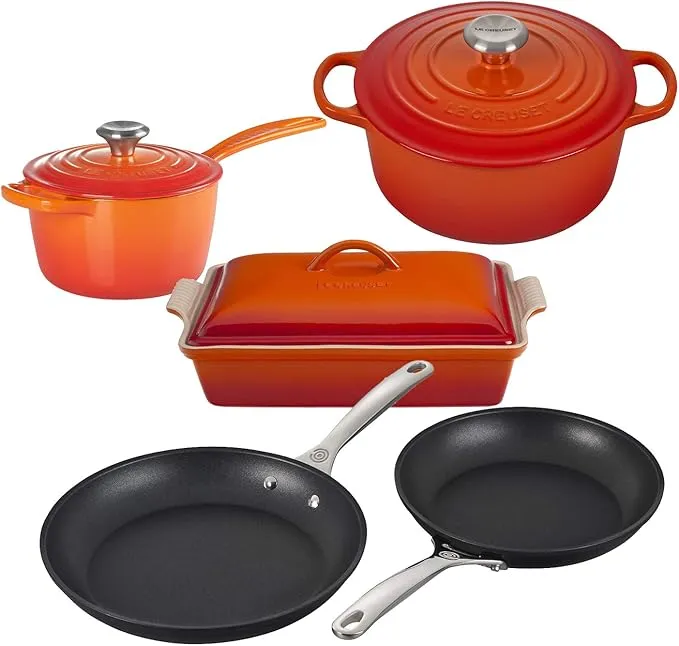 Le Creuset 8-piece enameled cast iron and nonstick cookware set for multi-purpose cooking.