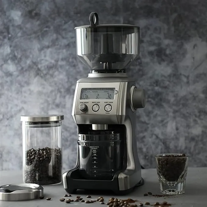 Professional electric espresso grinder for coffee beans.