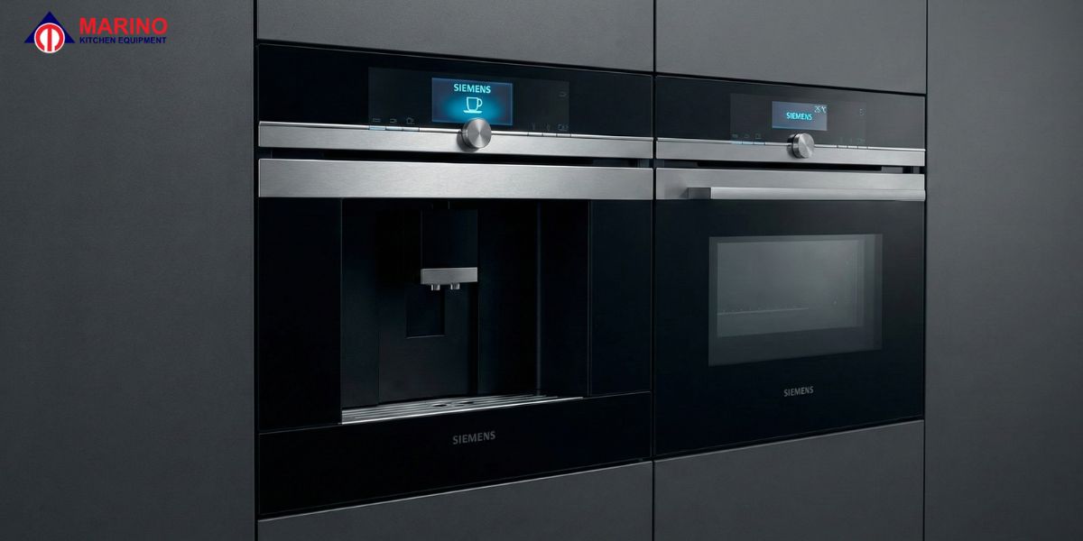 Modern luxury kitchen featuring Siemens built-in oven, refrigerator, and dishwasher with Marino Kitchen Dubai branding